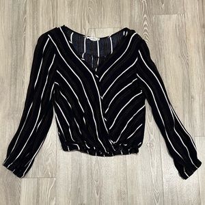 Small Rebellion dark navy blouse with brown and white stripes. Never been worn!